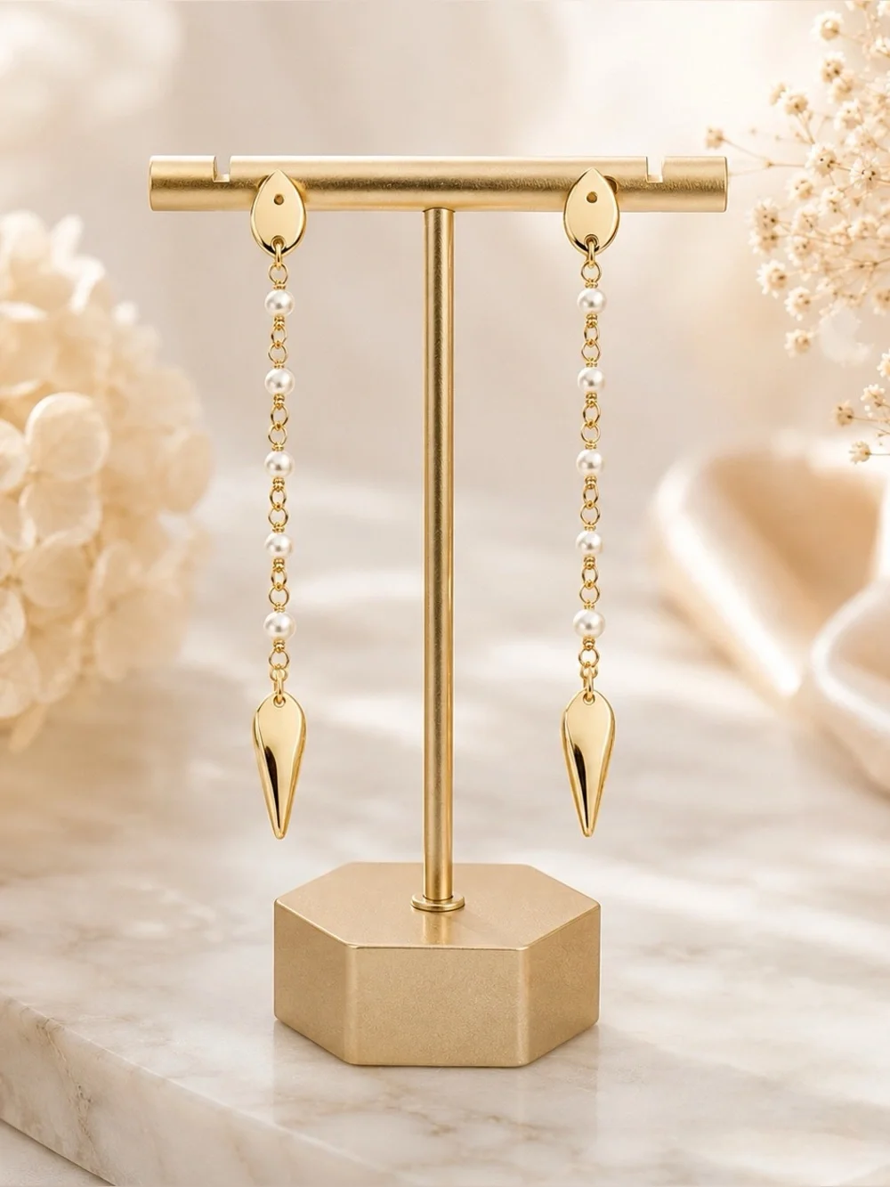 Tory Burch Snake Linear earring.